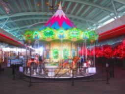 The NO ADULTS carousel at Maya Mall